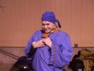 Solveig in a fetching periwinkle-blue Viking tunic and do-rag ensemble