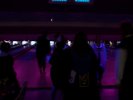 Mysterious shadows bowling under a black light